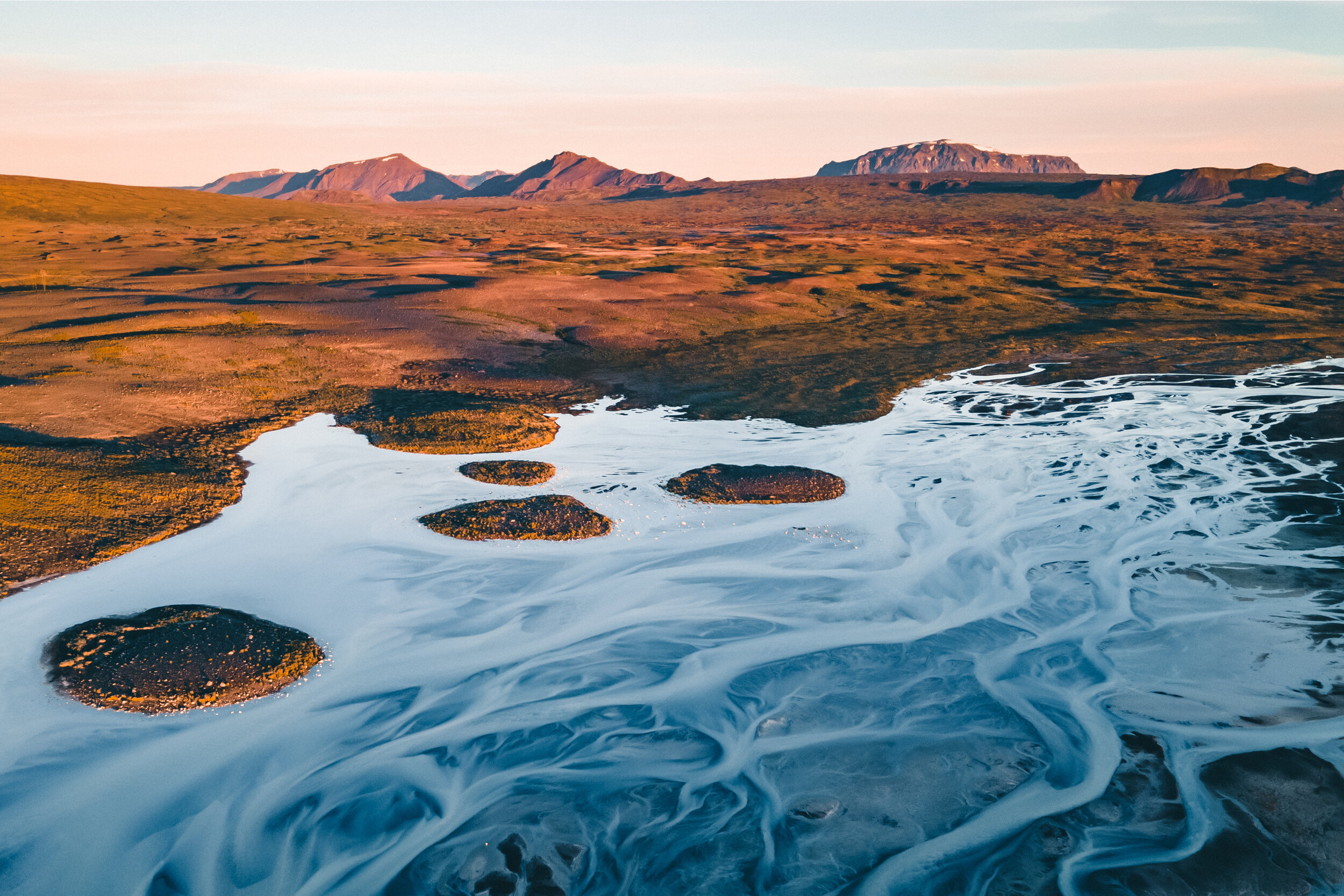 Water Stream with Mountains in Distance